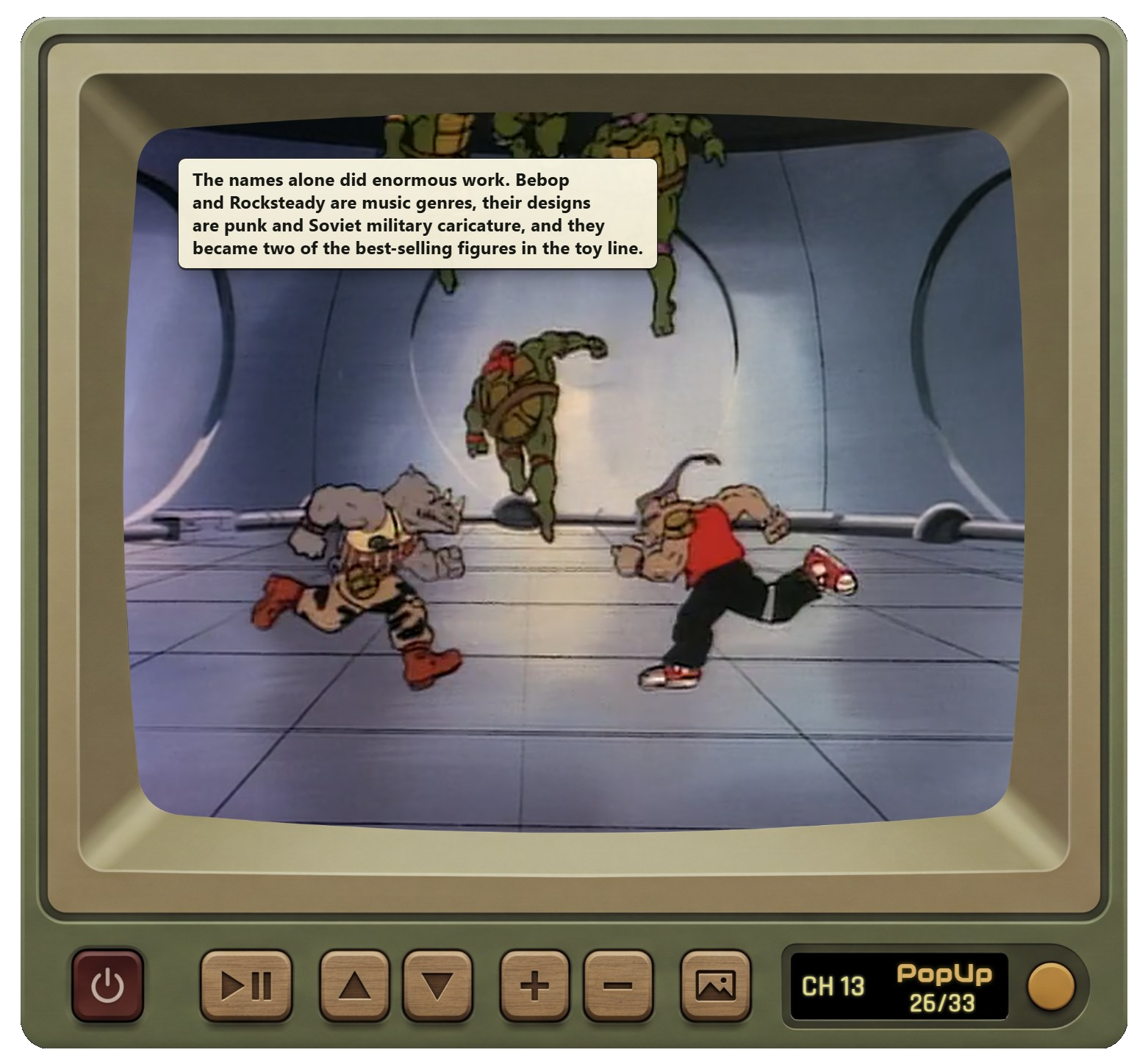 Olive PopUp Tube cabinet showing Teenage Mutant Ninja Turtles with a timed PopUp card.